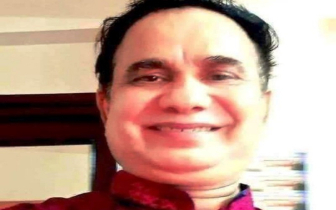 মা 