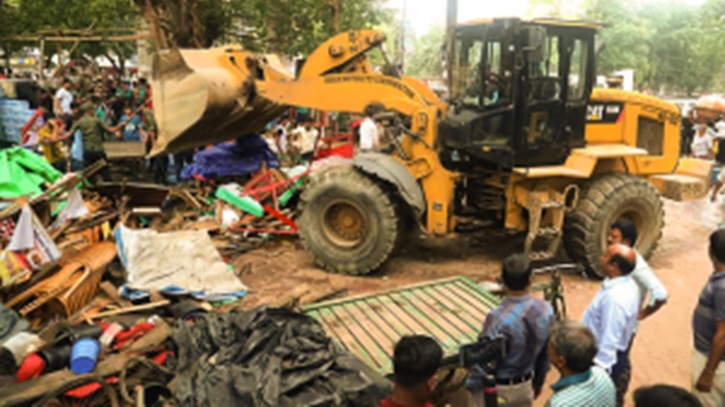 সোহরাওয়ার্দী উদ্যানে শতাধিক অবৈধ স্থাপনা গুঁড়িয়ে দিলো দক্ষিণ সিটি সোহরাওয়ার্দী উদ্যানে শতাধিক অবৈধ স্থাপনা গুঁড়িয়ে দিলো দক্ষিণ সিটি